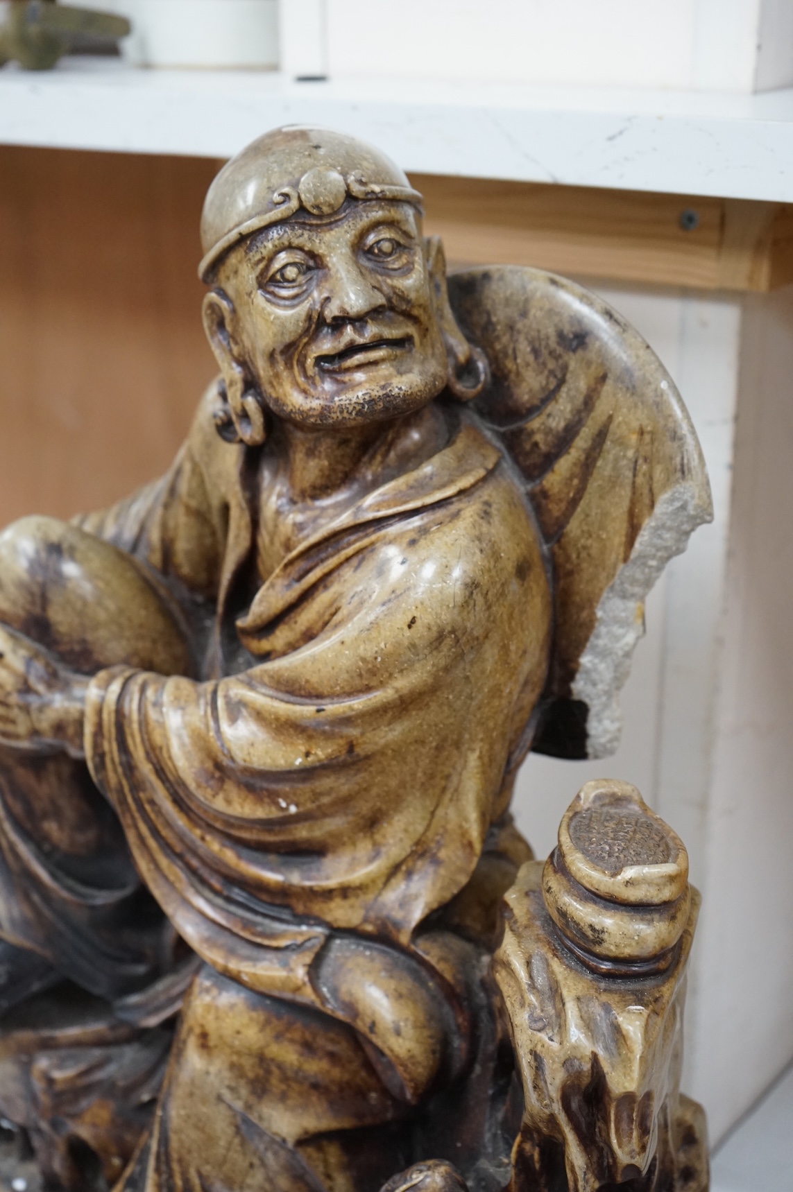 A large Chinese soapstone figure of a Luohan, 48cm